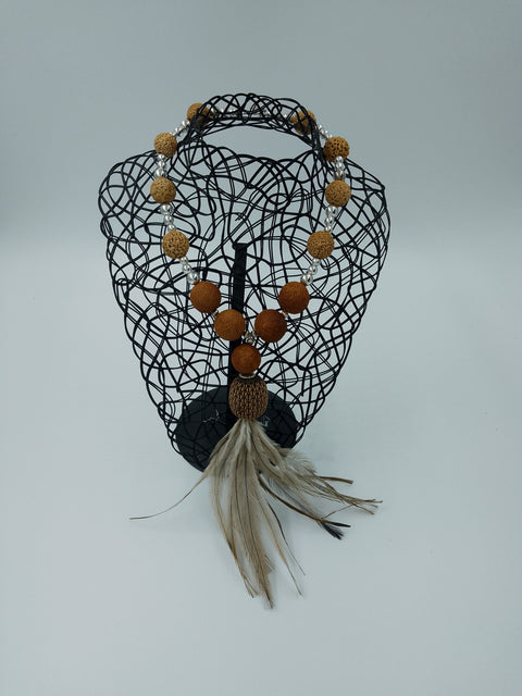 Hand carved SheOak pod Necklace with Emu Feather.